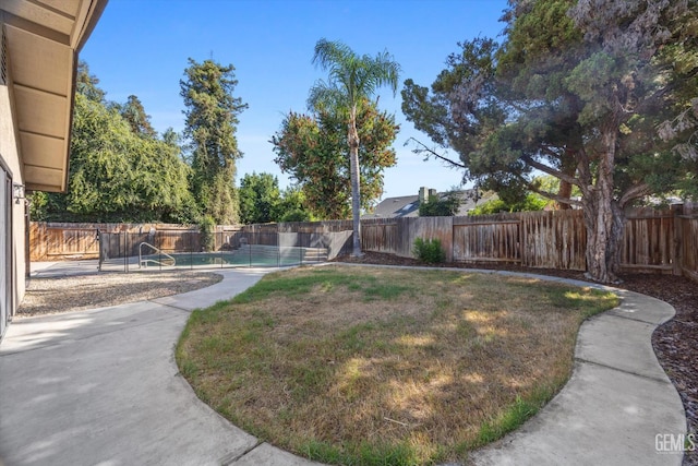 3112 Harrogate Ln, Bakersfield, CA 93309 - fenced backyard with a patio area