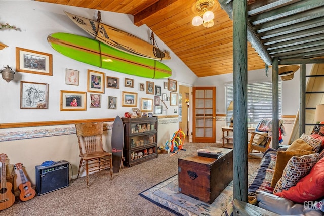 interior space featuring vaulted ceiling with beams, wood ceiling, carpet floors, and french doors