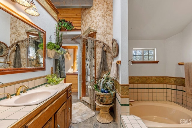 bathroom featuring vanity and a bathing tub