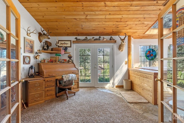 interior space featuring carpet flooring, french doors, vaulted ceiling, and wood ceiling