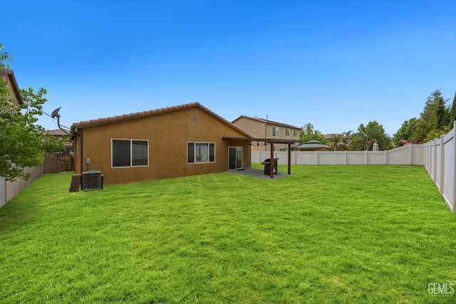 5711 Cordonata Way, Bakersfield, CA 93306 - rear view of house with a patio area, central AC unit, and stucco siding