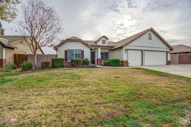 view of front of property with a garage and a front lawn