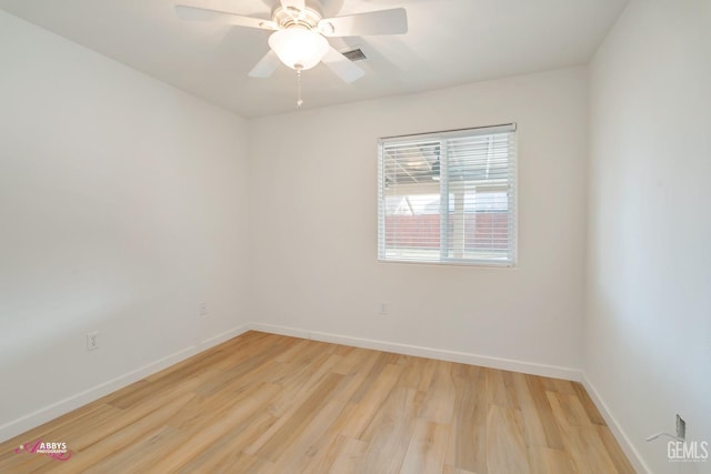 unfurnished room with ceiling fan and light hardwood / wood-style floors