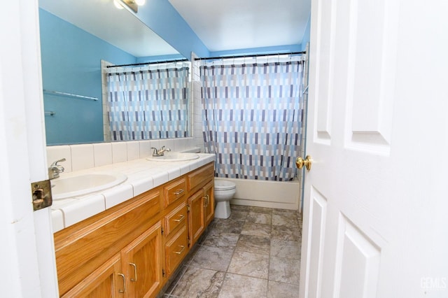 full bathroom with shower / bath combination with curtain, vanity, tasteful backsplash, and toilet