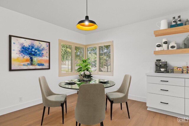 2330 Myrtle St, Bakersfield, CA 93301 - dining room featuring light wood-type flooring and baseboards