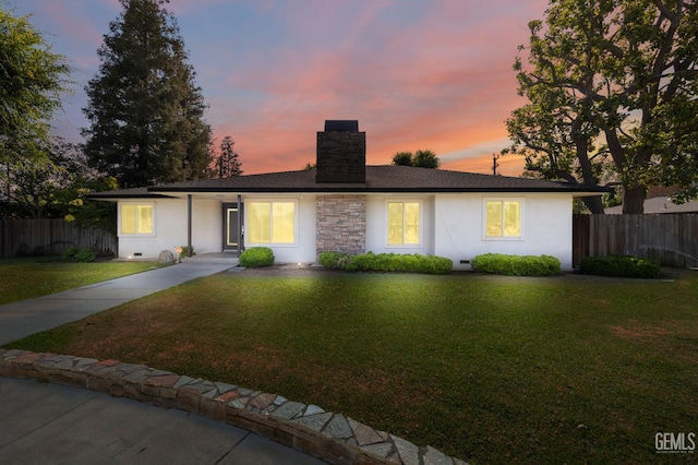 2330 Myrtle St, Bakersfield, CA 93301 - single story home with a chimney and stucco siding