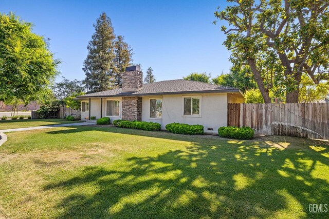 2330 Myrtle St, Bakersfield, CA 93301 - ranch-style home with stucco siding, a chimney, and stone siding