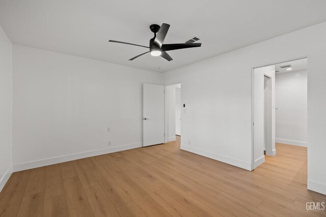 2330 Myrtle St, Bakersfield, CA 93301 - unfurnished bedroom featuring light wood-type flooring, baseboards, and ceiling fan