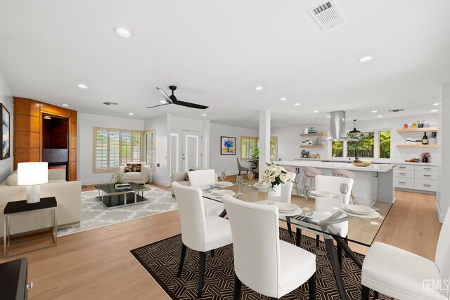 2330 Myrtle St, Bakersfield, CA 93301 - dining area featuring recessed lighting, light wood-style floors, healthy amount of natural light, ceiling fan, and baseboards