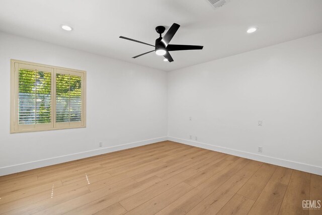 2330 Myrtle St, Bakersfield, CA 93301 - unfurnished room featuring light wood finished floors, baseboards, ceiling fan, and recessed lighting