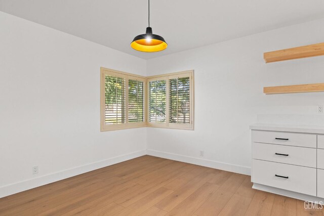 2330 Myrtle St, Bakersfield, CA 93301 - spare room featuring light wood finished floors and baseboards