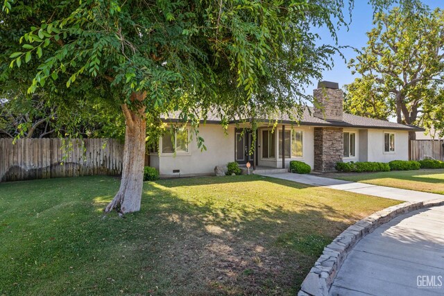 2330 Myrtle St, Bakersfield, CA 93301 - view of front facade featuring stucco siding, a chimney, crawl space, and stone siding