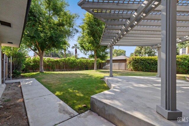 2330 Myrtle St, Bakersfield, CA 93301 - view of yard featuring a patio and a pergola