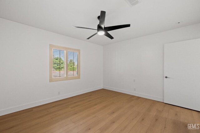 2330 Myrtle St, Bakersfield, CA 93301 - spare room with light wood-style flooring, ceiling fan, and baseboards