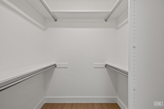 2330 Myrtle St, Bakersfield, CA 93301 - spacious closet with light wood finished floors