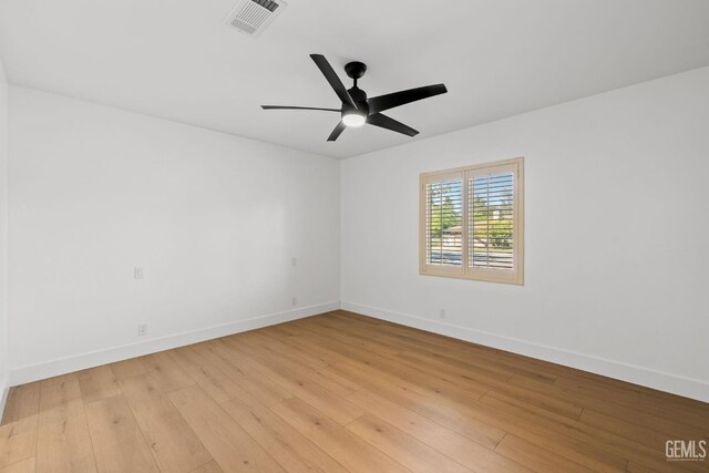 2330 Myrtle St, Bakersfield, CA 93301 - unfurnished room with baseboards, light wood-type flooring, and ceiling fan