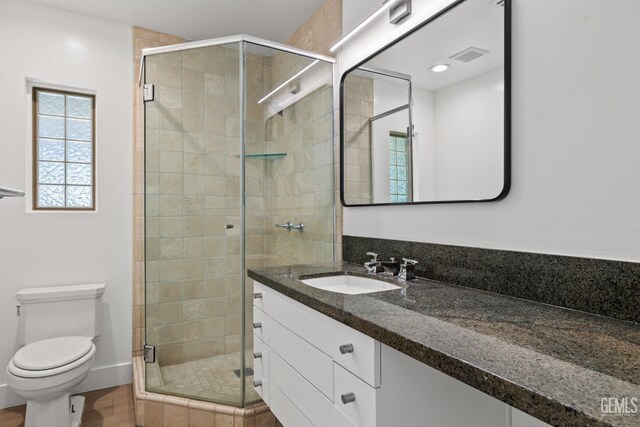 2330 Myrtle St, Bakersfield, CA 93301 - bathroom with a shower stall, toilet, and vanity