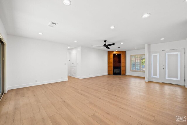 2330 Myrtle St, Bakersfield, CA 93301 - unfurnished living room with ceiling fan, a fireplace, recessed lighting, baseboards, and light wood-style flooring