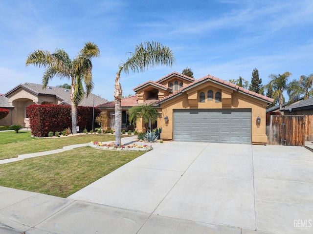 view of front facade featuring a front lawn, fence, concrete driveway, stucco siding, and a garage