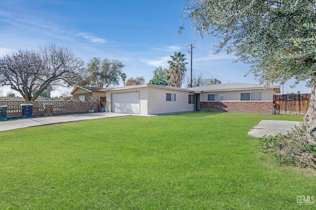 ranch-style home featuring a garage and a front lawn