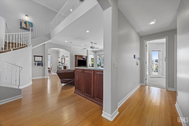 2120 Wedgemont Pl, Bakersfield, CA 93311 - entrance foyer featuring arched walkways, light wood-style floors, healthy amount of natural light, a ceiling fan, and recessed lighting