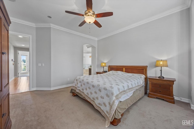 2120 Wedgemont Pl, Bakersfield, CA 93311 - bedroom featuring arched walkways, carpet flooring, ornamental molding, a ceiling fan, and connected bathroom