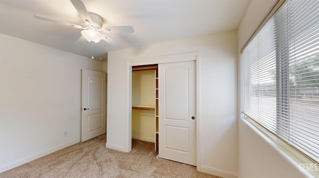 1334 Renfro Rd, Bakersfield, CA 93314 - unfurnished bedroom featuring a closet, light colored carpet, baseboards, and ceiling fan