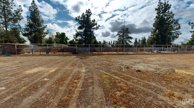 1334 Renfro Rd, Bakersfield, CA 93314 - view of yard with a view of countryside, an enclosed horse arena, and fence