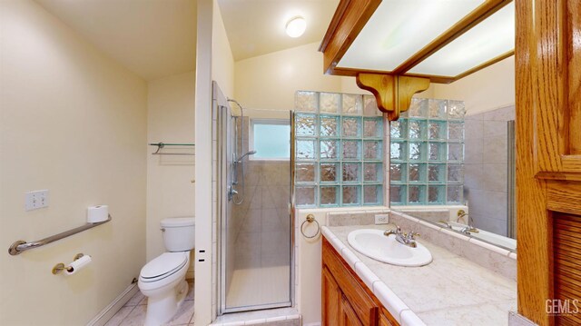 1334 Renfro Rd, Bakersfield, CA 93314 - bathroom featuring toilet, a shower stall, vanity, and tile patterned flooring