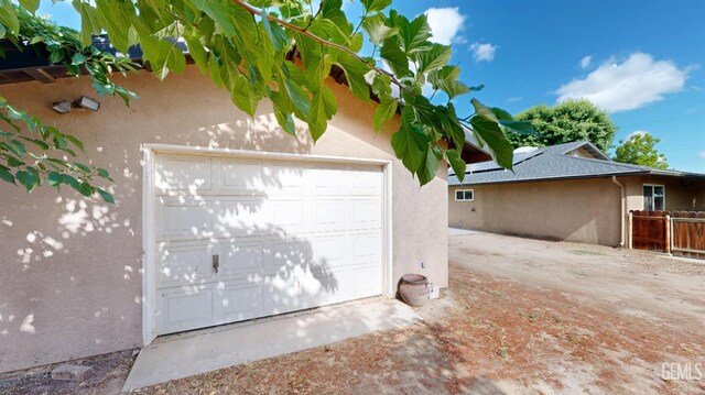 1334 Renfro Rd, Bakersfield, CA 93314 - garage featuring fence and driveway