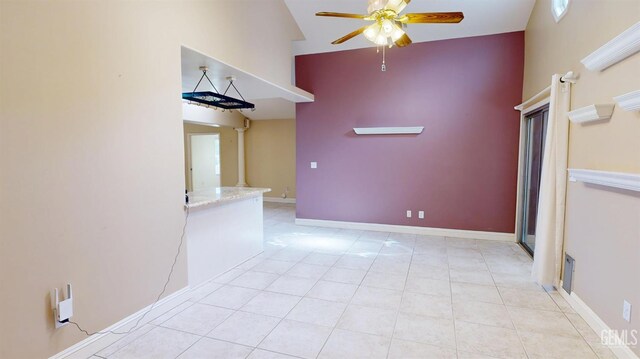 1334 Renfro Rd, Bakersfield, CA 93314 - unfurnished room with a ceiling fan, tile patterned flooring, a towering ceiling, and baseboards