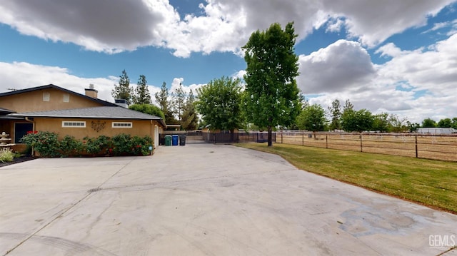 1334 Renfro Rd, Bakersfield, CA 93314 - view of home's exterior featuring concrete driveway and stucco siding