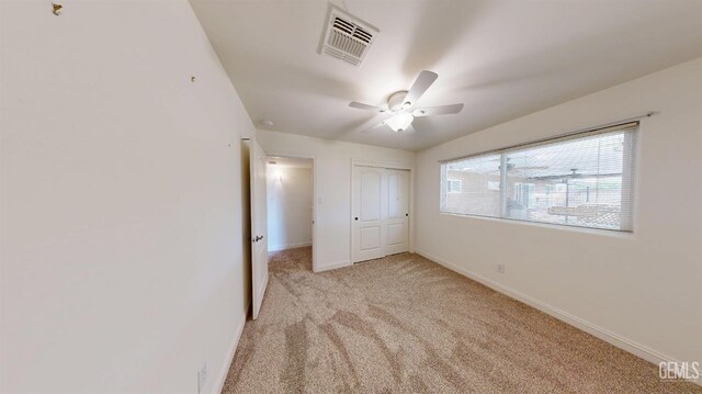 1334 Renfro Rd, Bakersfield, CA 93314 - unfurnished bedroom with light carpet, baseboards, a closet, and a ceiling fan