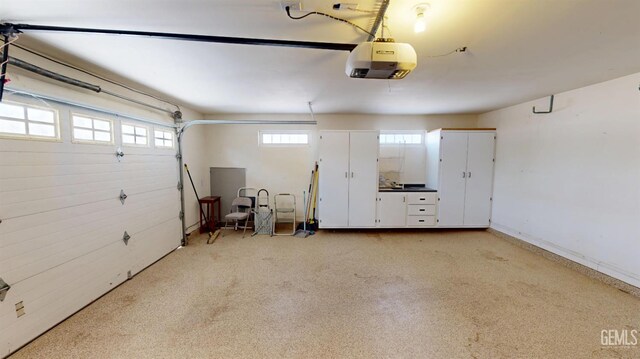 1334 Renfro Rd, Bakersfield, CA 93314 - garage featuring a garage door opener