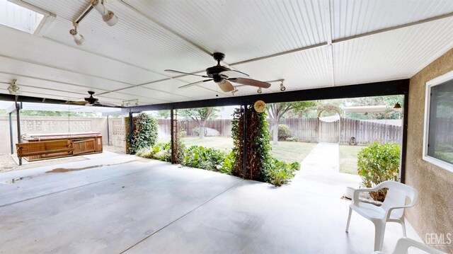 1334 Renfro Rd, Bakersfield, CA 93314 - view of patio / terrace with a hot tub, a ceiling fan, and a fenced backyard