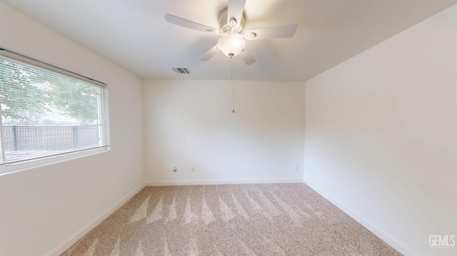 1334 Renfro Rd, Bakersfield, CA 93314 - empty room with carpet floors, ceiling fan, and baseboards