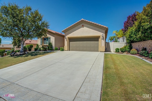 6100 Lassen Ridge Rd, Bakersfield, CA 93306 - mediterranean / spanish home featuring stucco siding, an attached garage, a tile roof, and driveway