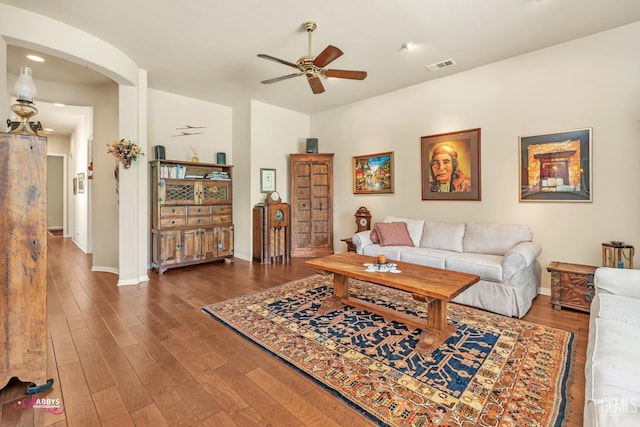 6100 Lassen Ridge Rd, Bakersfield, CA 93306 - living room featuring ceiling fan, arched walkways, wood finished floors, and recessed lighting