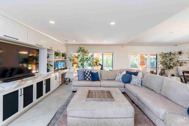 854 Vineland Rd, Bakersfield, CA 93306 - living area with recessed lighting and light stone finish floors