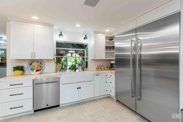 854 Vineland Rd, Bakersfield, CA 93306 - kitchen with appliances with stainless steel finishes, backsplash, white cabinetry, open shelves, and recessed lighting