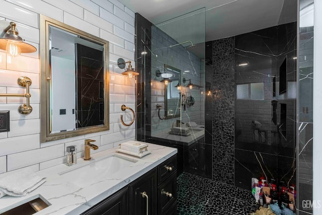 854 Vineland Rd, Bakersfield, CA 93306 - full bathroom featuring vanity, a tile shower, and decorative backsplash
