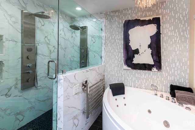 854 Vineland Rd, Bakersfield, CA 93306 - full bath with a tub with jets, a marble finish shower, recessed lighting, and tile walls