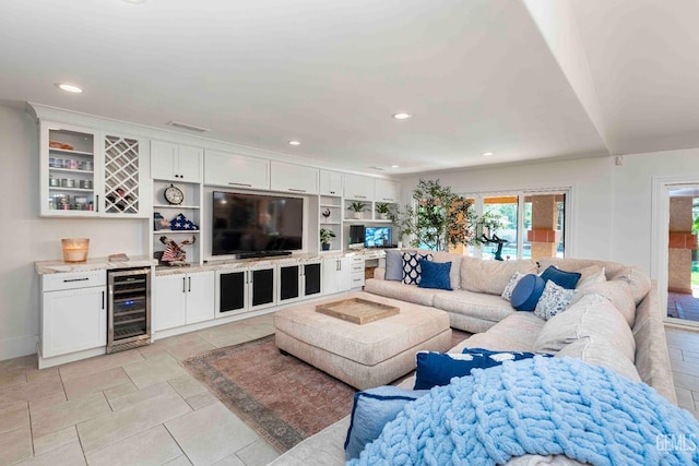 854 Vineland Rd, Bakersfield, CA 93306 - living room featuring wine cooler, a bar, recessed lighting, and light tile patterned floors