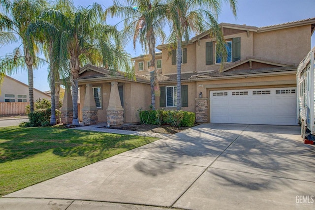 view of front facade featuring a garage and a front yard