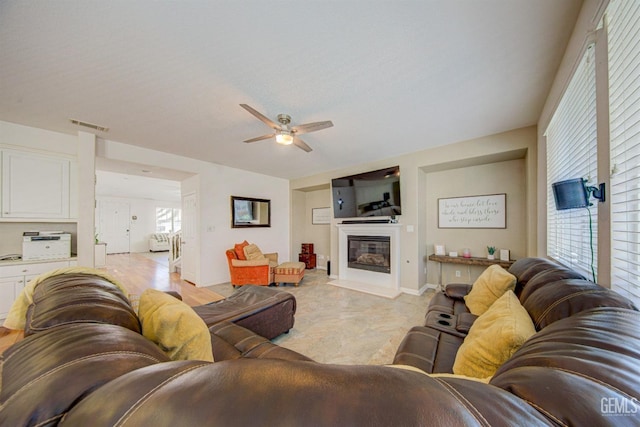 living room with ceiling fan