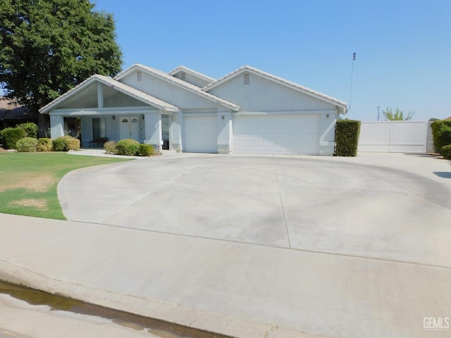 view of front of property with a garage