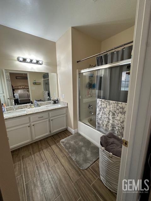 bathroom featuring vanity and shower / washtub combination