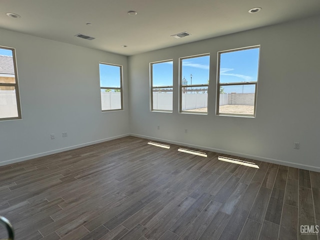 2411 Addlington St, Bakersfield, CA 93311 - unfurnished room featuring dark wood-style floors and recessed lighting