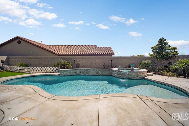 9311 Caliente Creek Ct, Bakersfield, CA 93311 - view of pool featuring a fenced backyard, a patio area, and a pool with connected hot tub