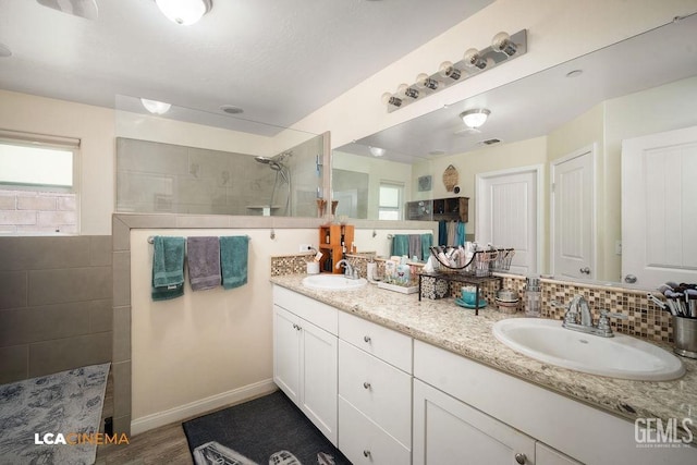 9311 Caliente Creek Ct, Bakersfield, CA 93311 - full bathroom with a walk in shower and double vanity